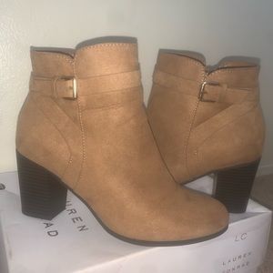 Tan, suede, ankle boots. The brand is “Lauren Conrad”. It is a size 8 boot.